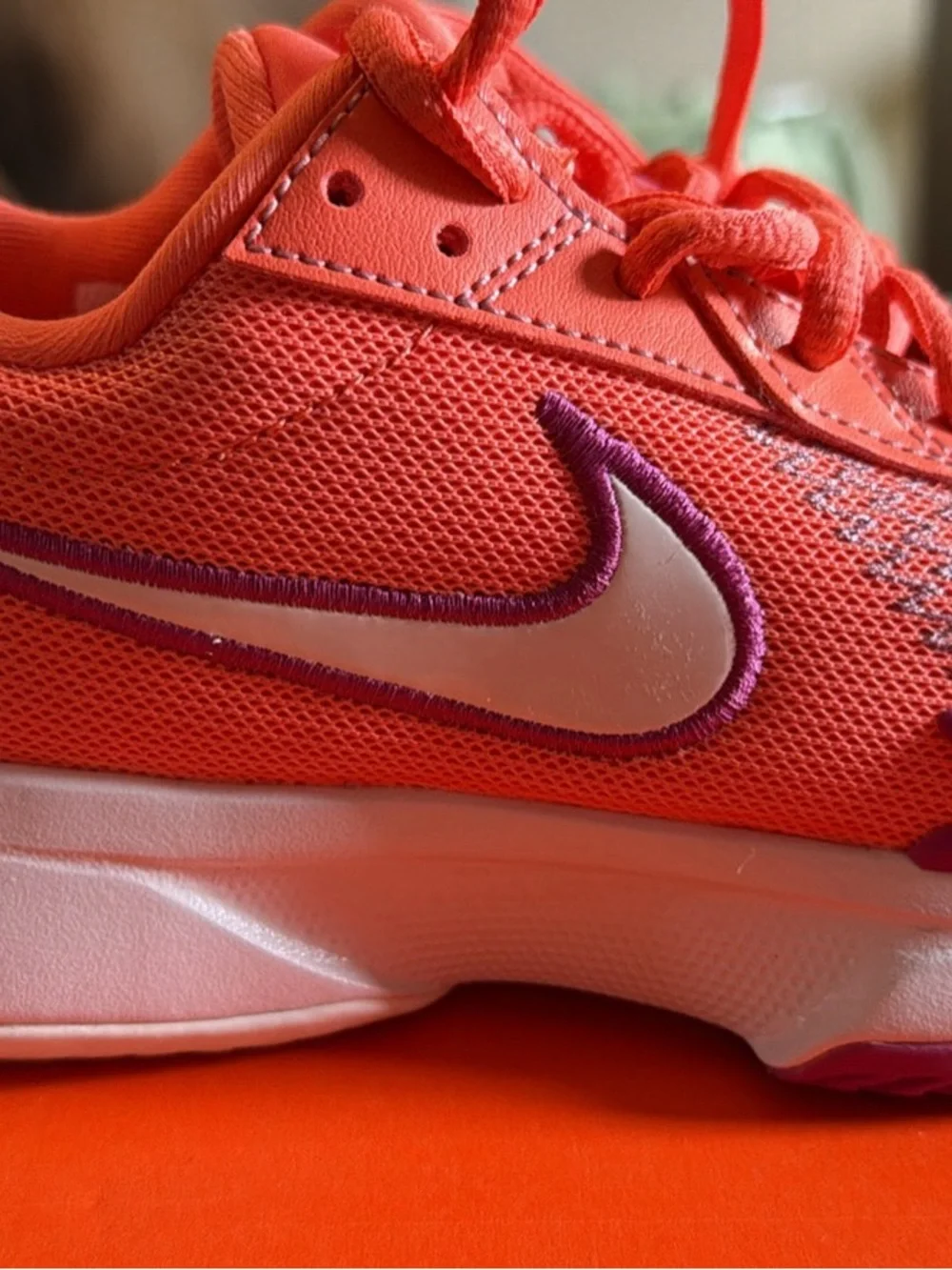 Nike Women's Coral Pink Athletic Sneakers with Purple Trim